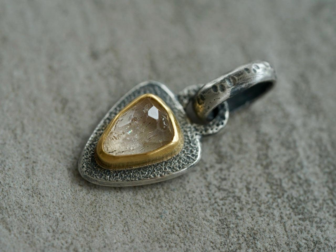 Topaz and 22k gold pendant