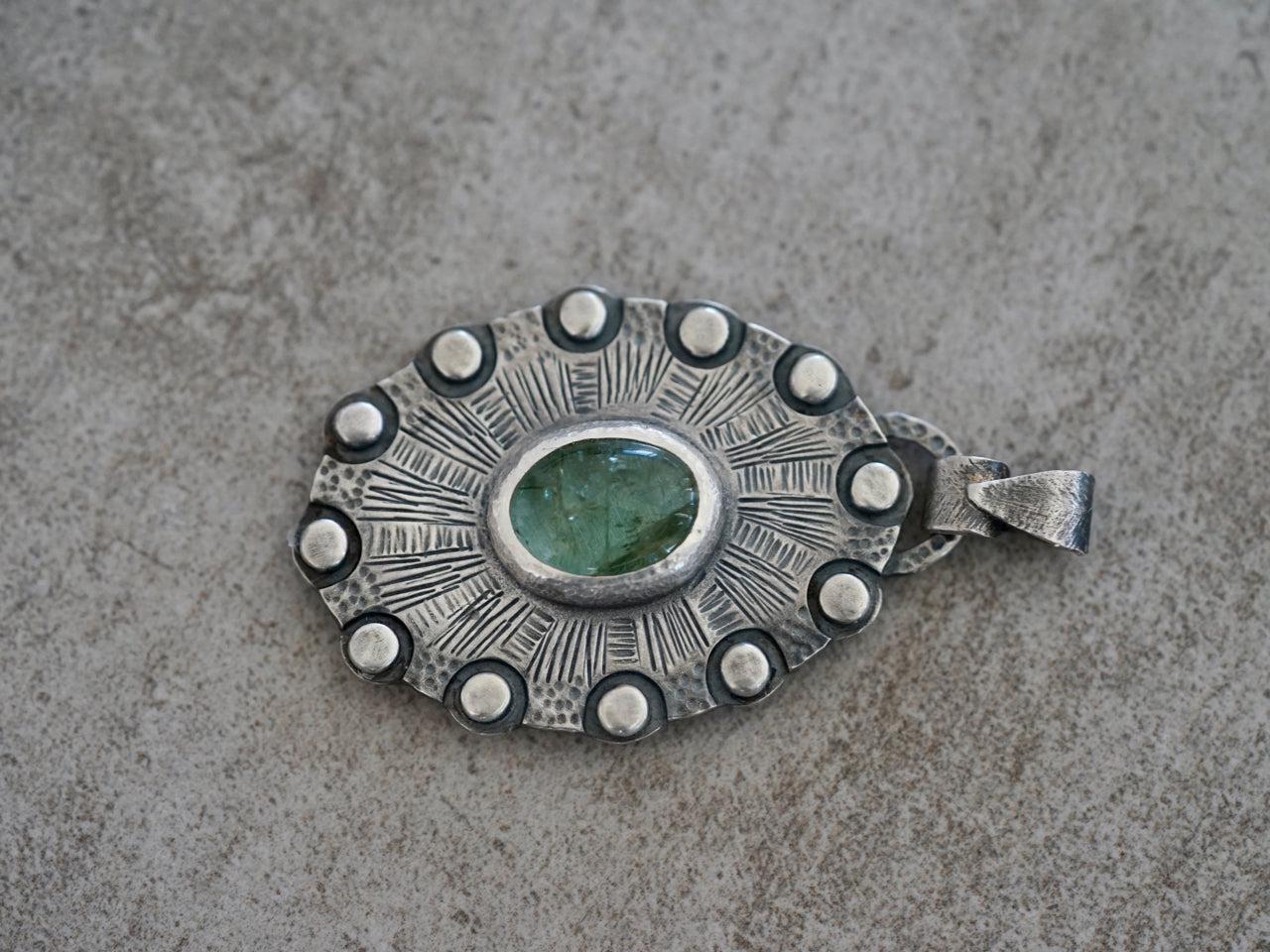 Aquamarine, shield of twelve pendant