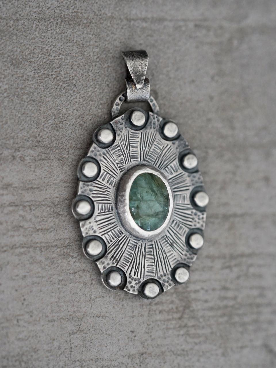 Aquamarine, shield of twelve pendant