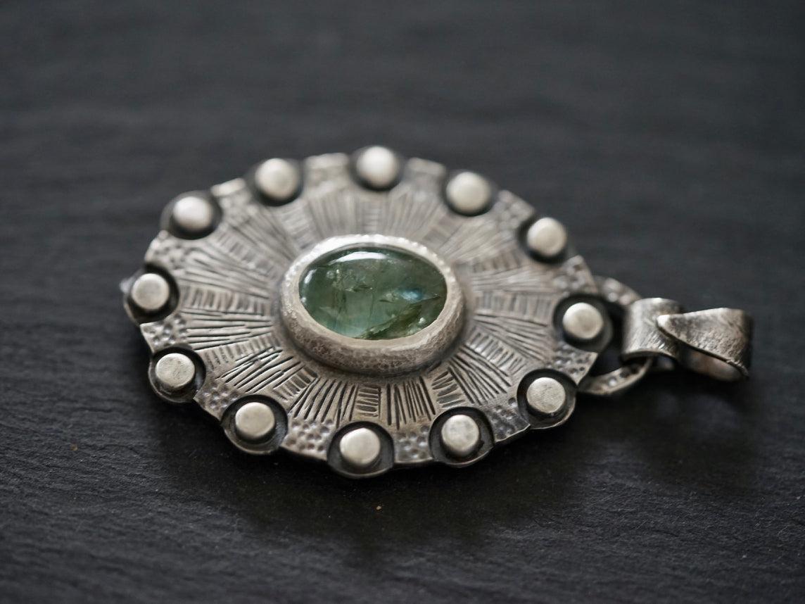 Aquamarine, shield of twelve pendant