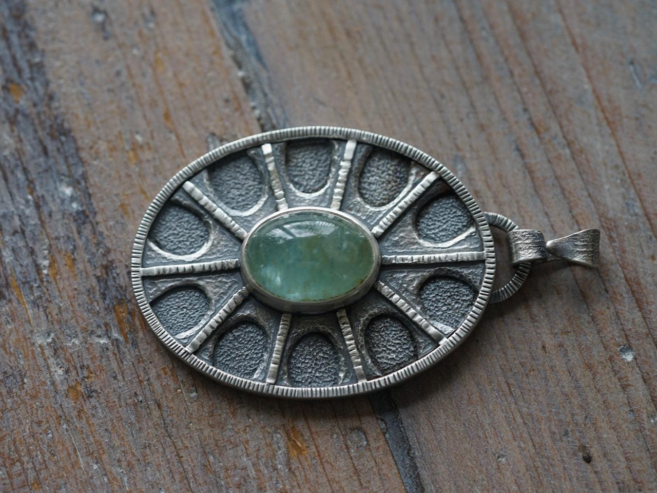 Aquamarine shield pendant