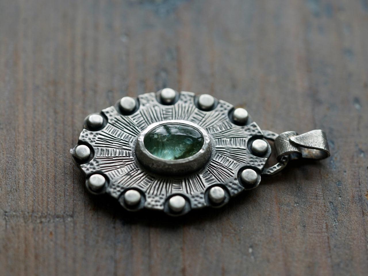 Aquamarine, shield of twelve pendant