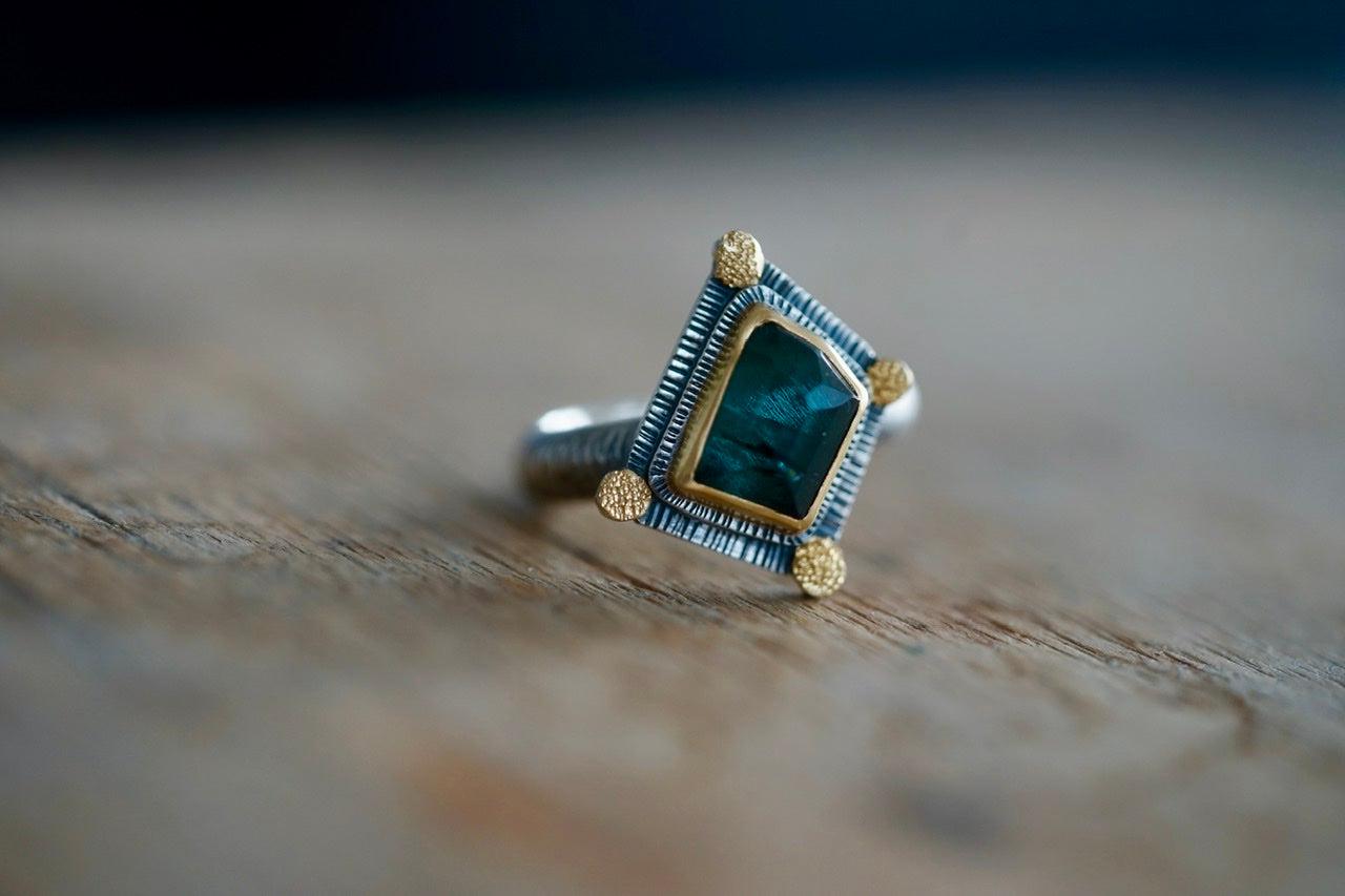 Irregularly shaped, teal blue, faceted tourmaline and 22k gold statement ring, size 7.75