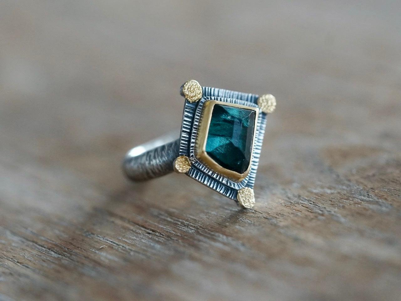 Irregularly shaped, teal blue, faceted tourmaline and 22k gold statement ring, size 7.75