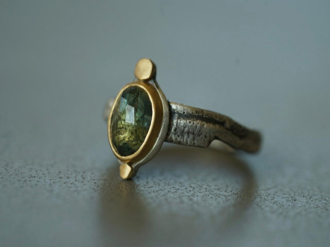 Elegant semi-translucent green sapphire and 22k gold ring, size 7