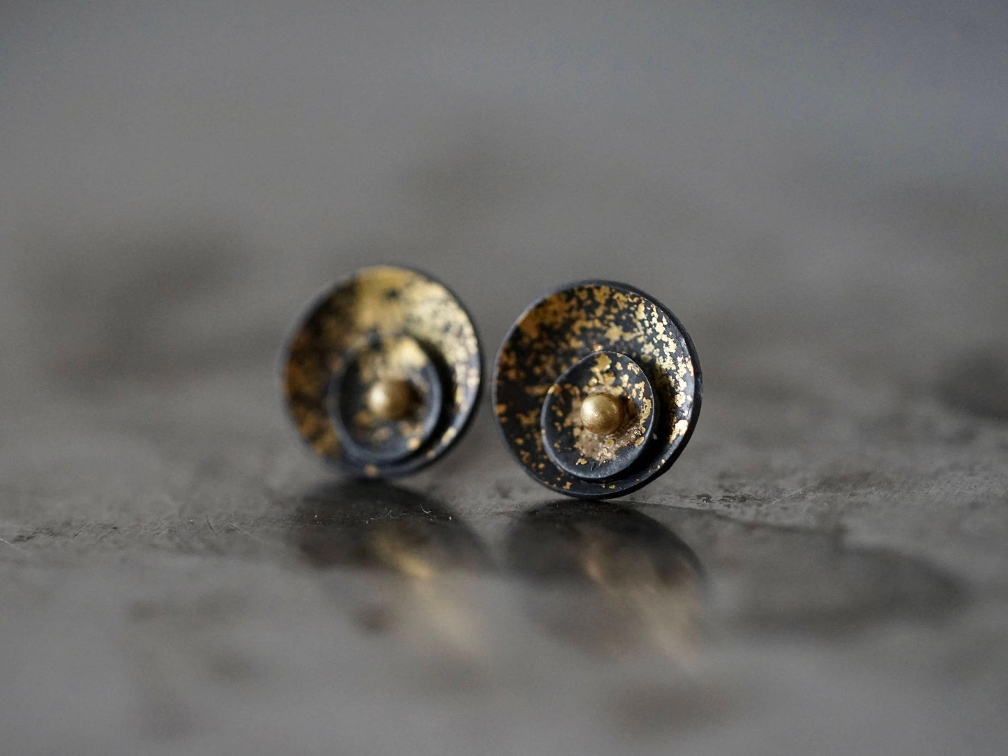 Midas interrupted gold on black shell post earrings