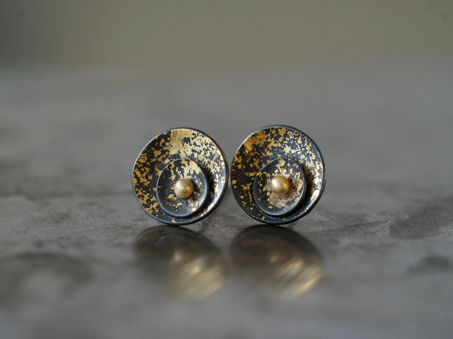 Midas interrupted gold on black shell post earrings