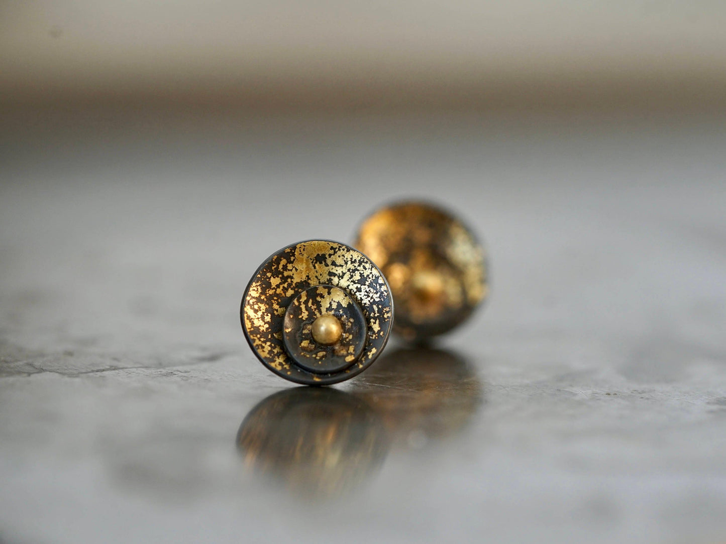 Midas interrupted gold on black shell post earrings