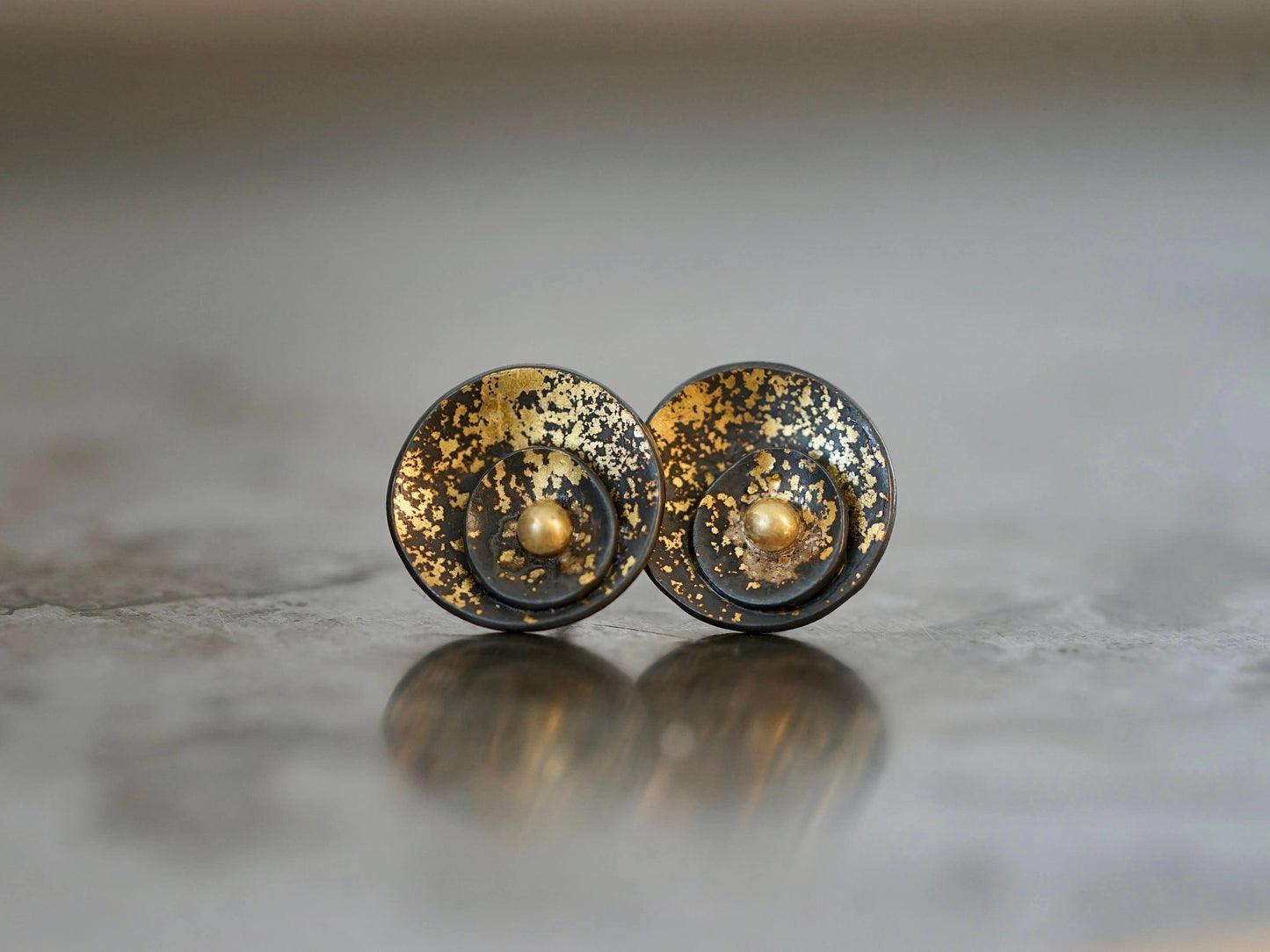 Midas interrupted gold on black shell post earrings