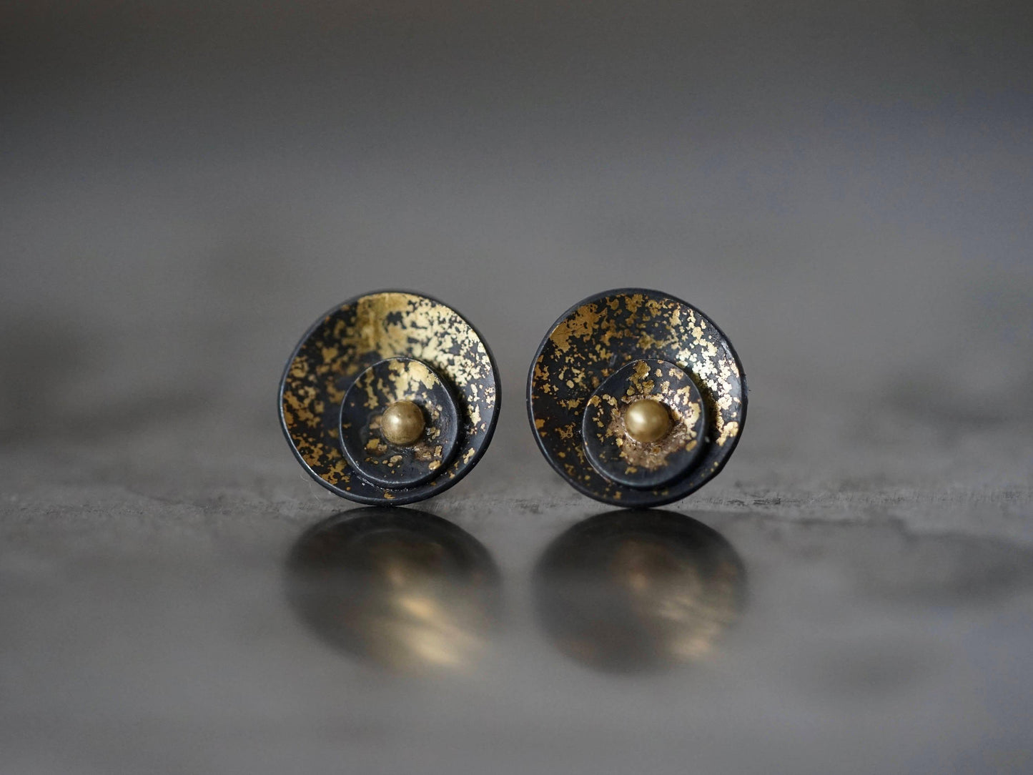 Midas interrupted gold on black shell post earrings