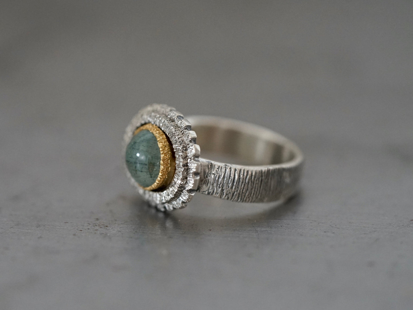 textured aquamarine and gold ring