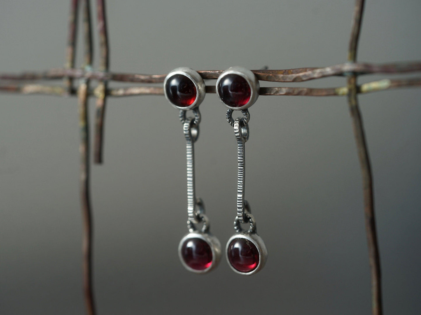 Linear garnet drop earrings