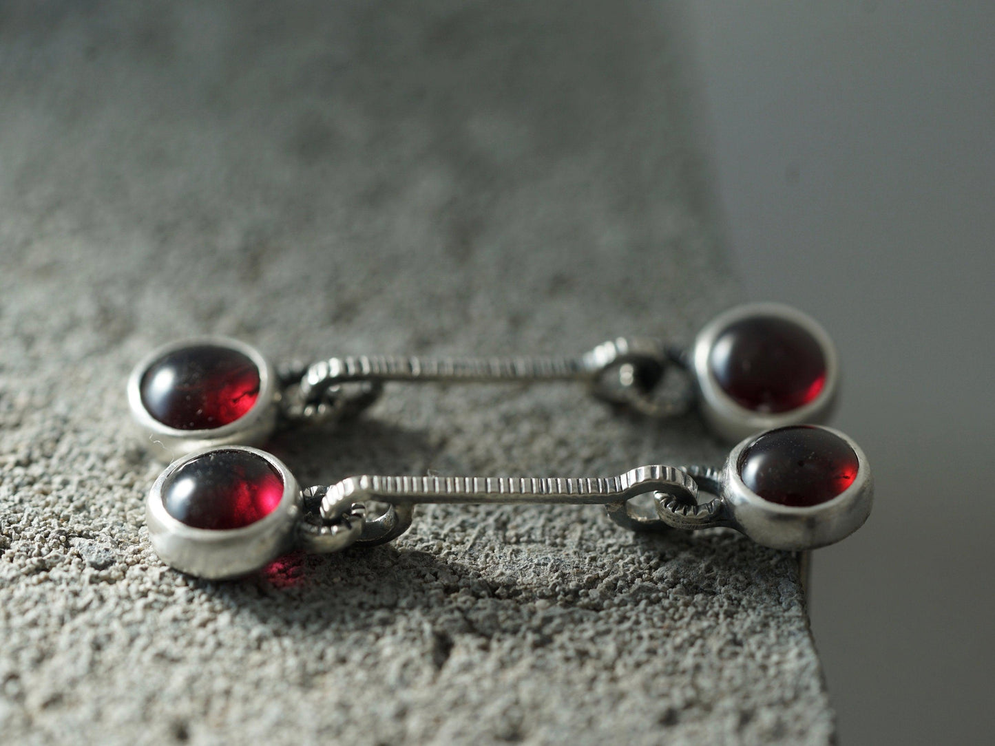 Linear garnet drop earrings