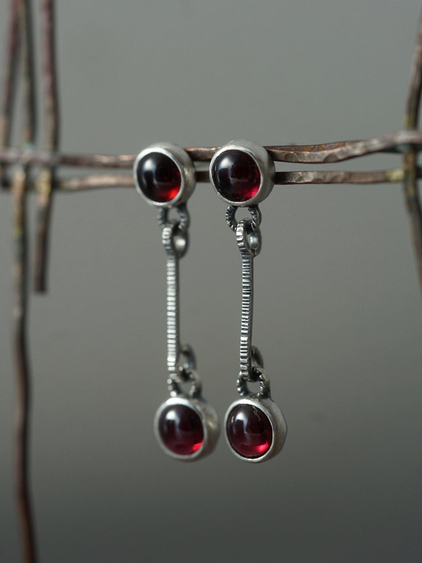 Linear garnet drop earrings