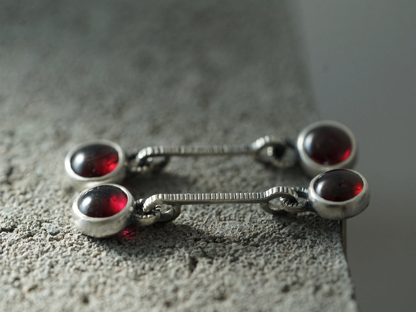 Linear garnet drop earrings