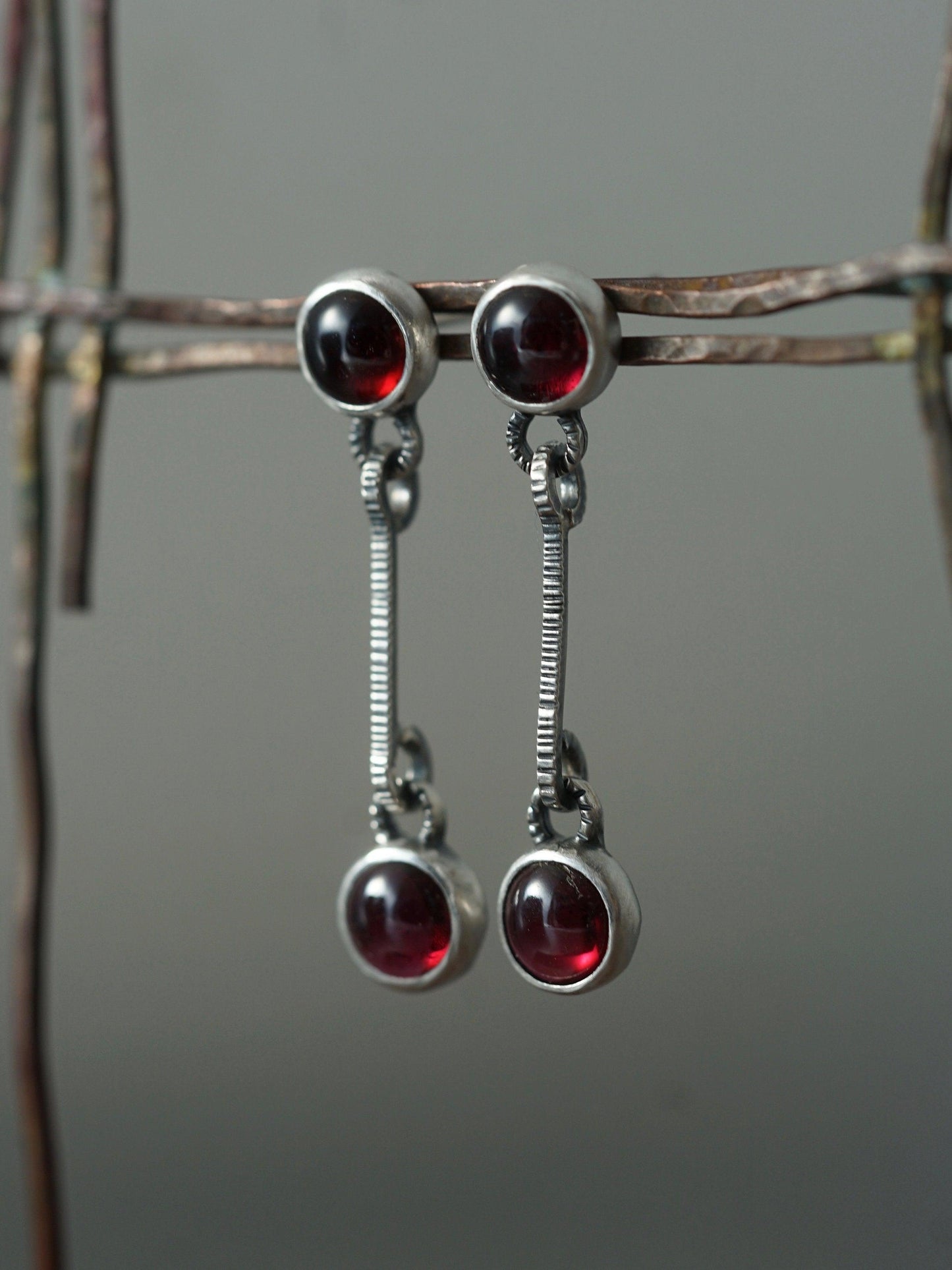 Linear garnet drop earrings